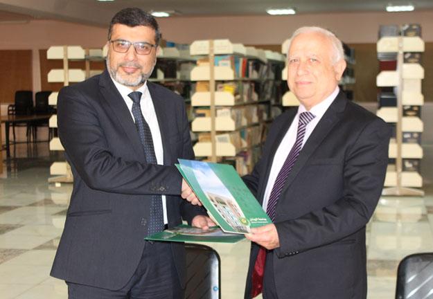 بروتوكول تعاون بين الجامعة وإذاعة الفجر