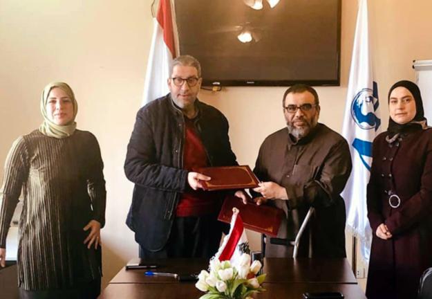 بروتوكول تعاون بين أكاديمية الأمين الدولية وبين جامعة الجنان